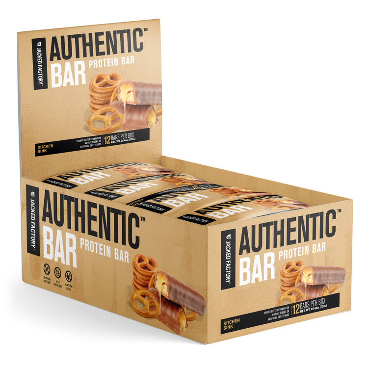 Jacked Factory's 12-pack of Kitchen Sink Authentic Bars in a beige box with pretzel and chocolate image
